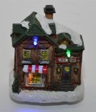 Weihnachtshaus dekoriert mit LED Beleuchtung / Cafe Shop